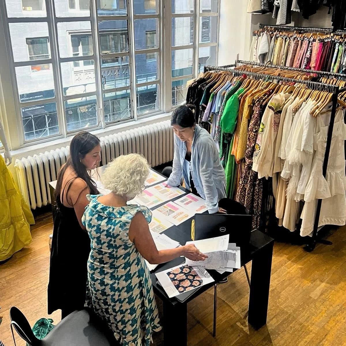Paper line sheets and binders in a buying session